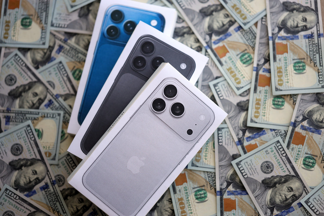Assorted iPhone 11 and newer models displayed for resale at PayMore Doraville